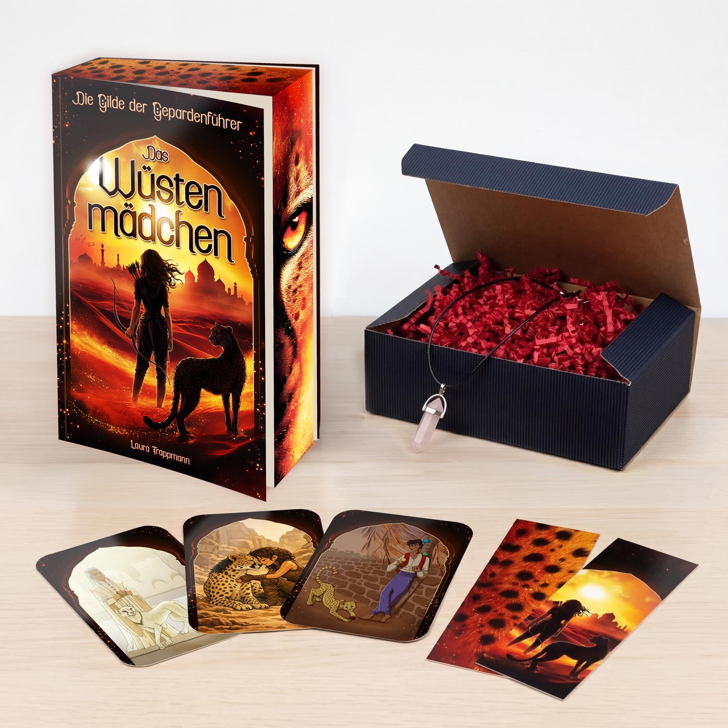 Das Wüstenmädchen Fanbox Produktfoto Set mit Lesezeichen und Charakterkarten und Baskit-Kette